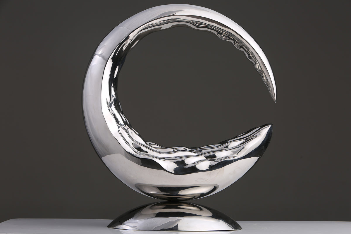 Mirror-Polished Crescent, studio photograph, view 1